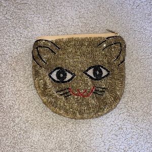UO gold cat clutch purse